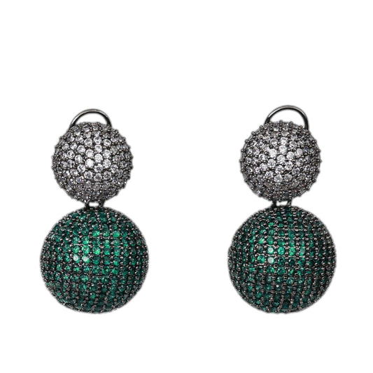 Pair of earrings with green and black gemstones on a white background