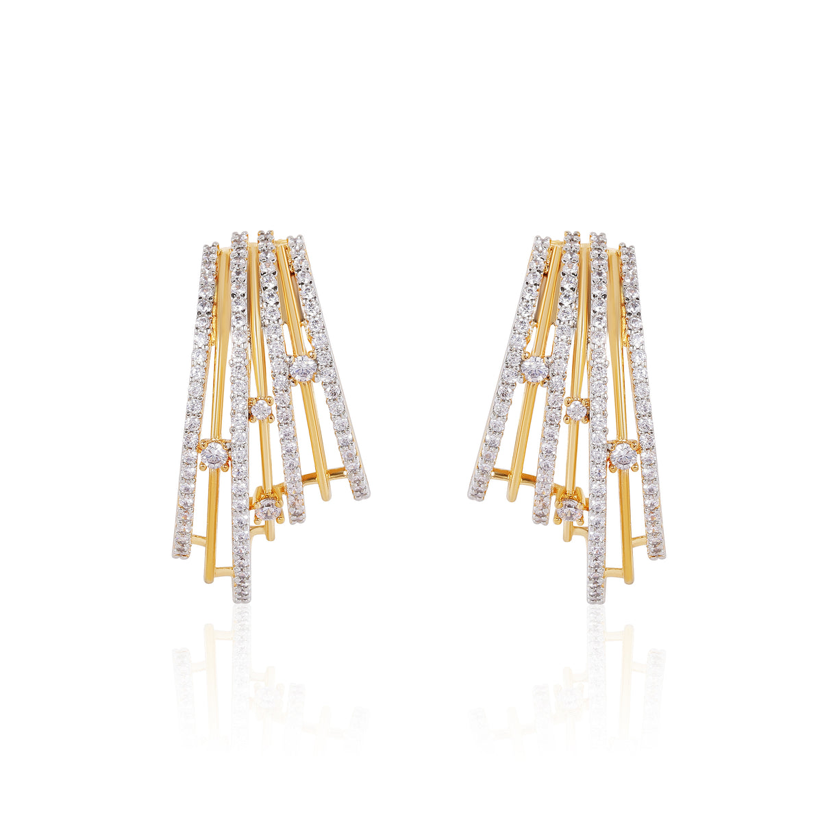 Gold and diamond earrings on a white background