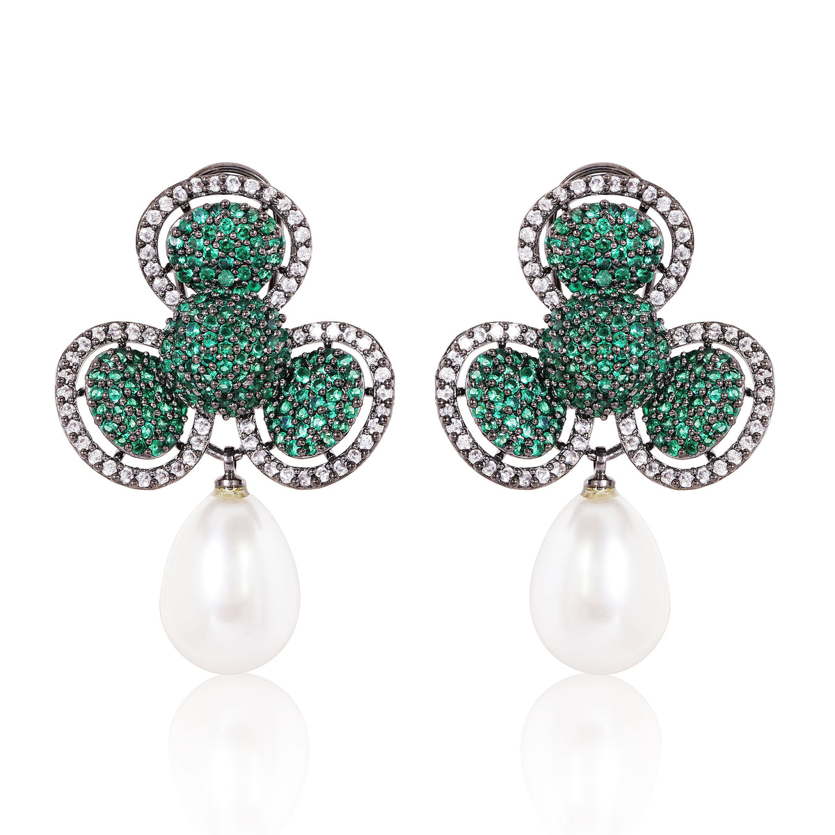 Pair of earrings with green gemstones and pearl drops on a white background
