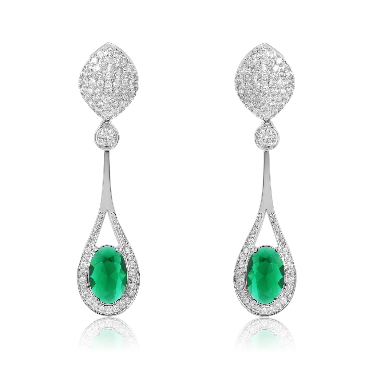 Pair of earrings with green gemstones and diamond-like stones on a white background