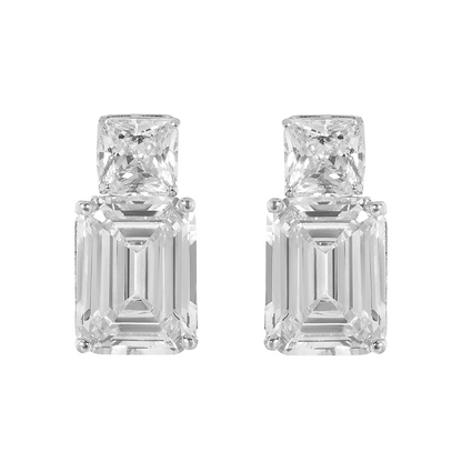 Pair of diamond earrings on a white background