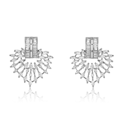 Pair of silver earrings with intricate designs on a white background